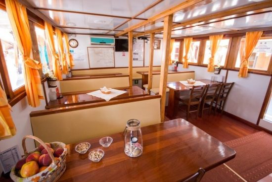 An example of the dining room on board a traditional ensuite vessel (Viktorika)