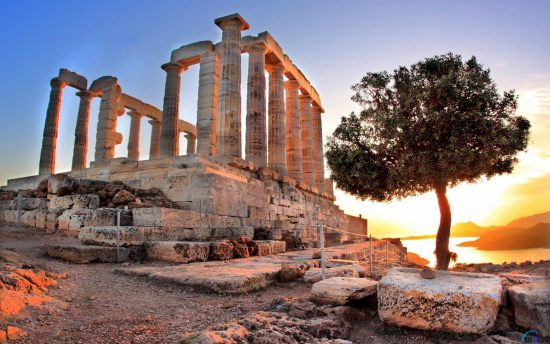 Sunset at Cape Sounion and the ancient Greek Temple of Poseidon.
