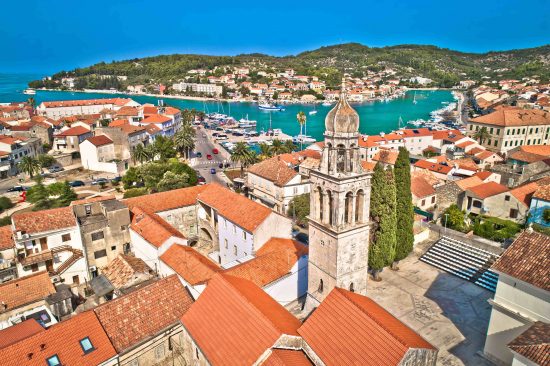 An aerial view of the town of Vela Luka on Korcula Island with the parish of St. Joseph's tower in view.
