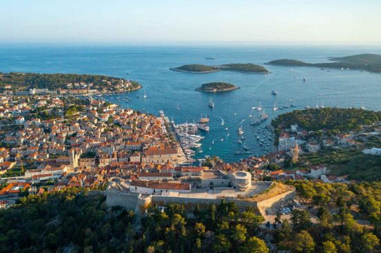 An aerial view of Hvar town with the Fortica Fortress in view.