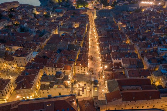 The Stradun - the main street in Dubrovnik's old town - as seen by drone in the evening.